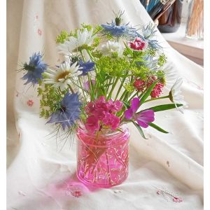 pink hand painted jar with spring flowers