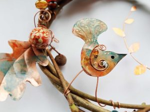 copper wire bird hedgerow glass beads acorns